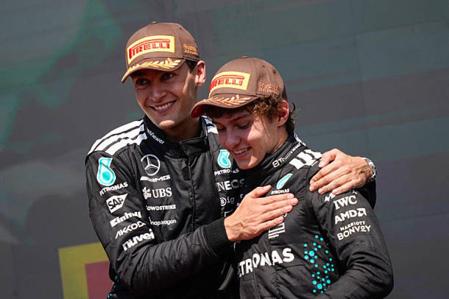 TOPSHOT - (L/R) Race winner Mercedes' British driver George Russell celebrates with teammate and third place finisher Mercedes' Italian driver Kimi Antonelli on the podium after the 2025 Formula 1 Grand Prix du Canada at Circuit Gilles-Villeneuve in Montreal, Canada, on June 15, 2025. (Photo by Geoff Robins / AFP) (Photo by GEOFF ROBINS/AFP via Getty Images)